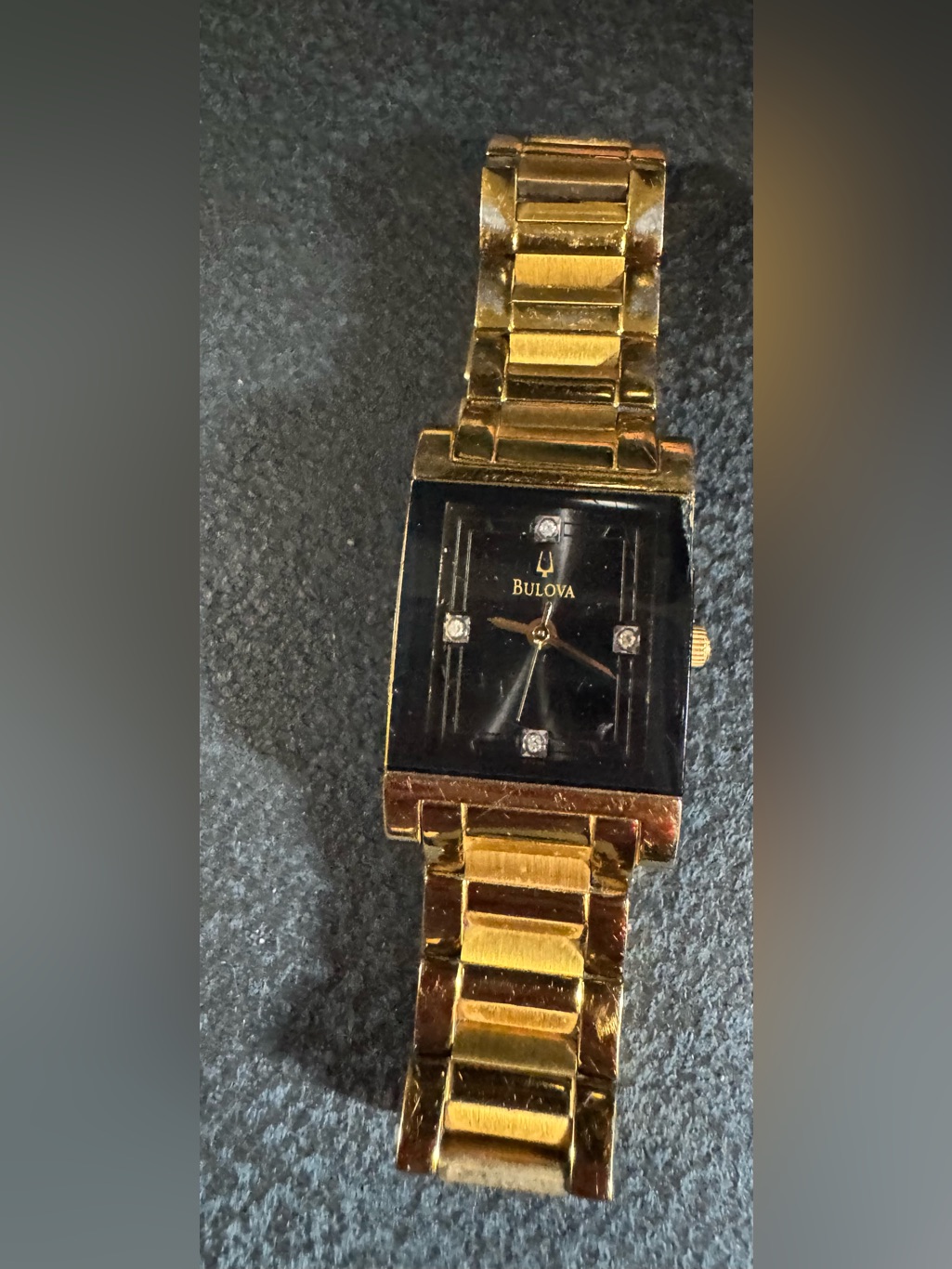 Bulova Gold Bracelet Watch With Black Dial And Crystal Markers